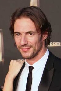 Thomas Hayo in Anzug und Krawatte.