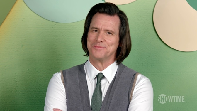 Jim Carrey in Hemd, Pullunder und Krawatte.